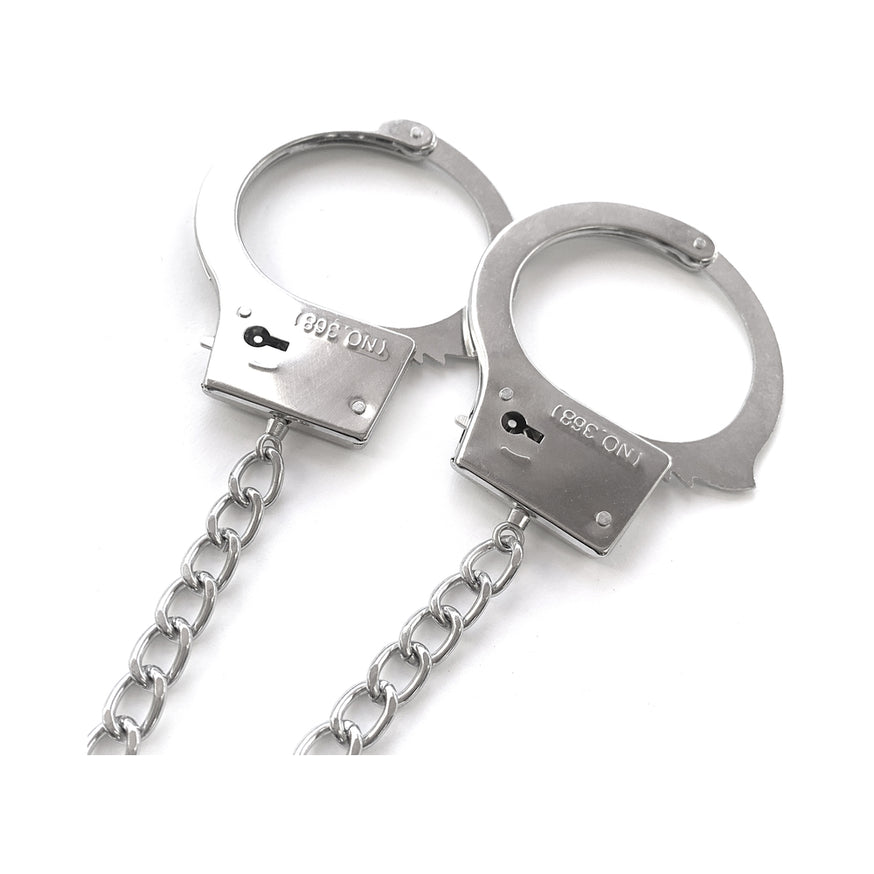 Nixie Metal Butt Plug & Handcuffs Set Silver